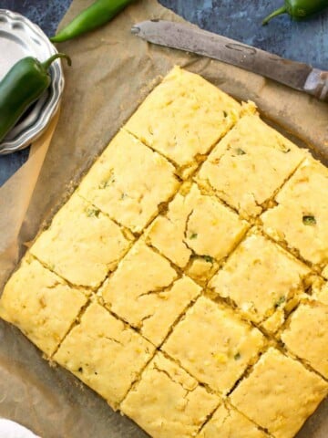 Overhead of jalapeño cornbread, sliced in to squares