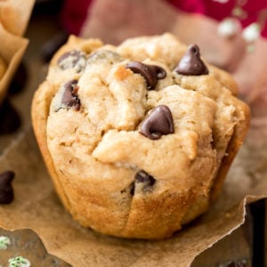 peanut butter muffin with chocolate chips on parchment paper