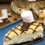 smores cheesecake slice on blue plate