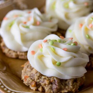 carrot cake cookies with icing and sprinkles