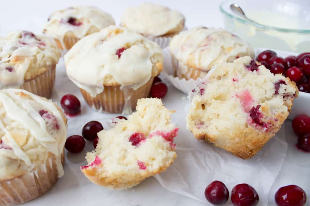 fluffy cranberry Muffins drizzled with white chocolate