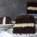 slice of chocolate cake with cheesecake filling