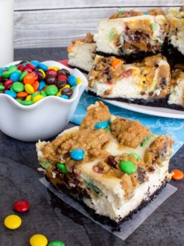 cheesecake and cookie swirled bars with M&ms