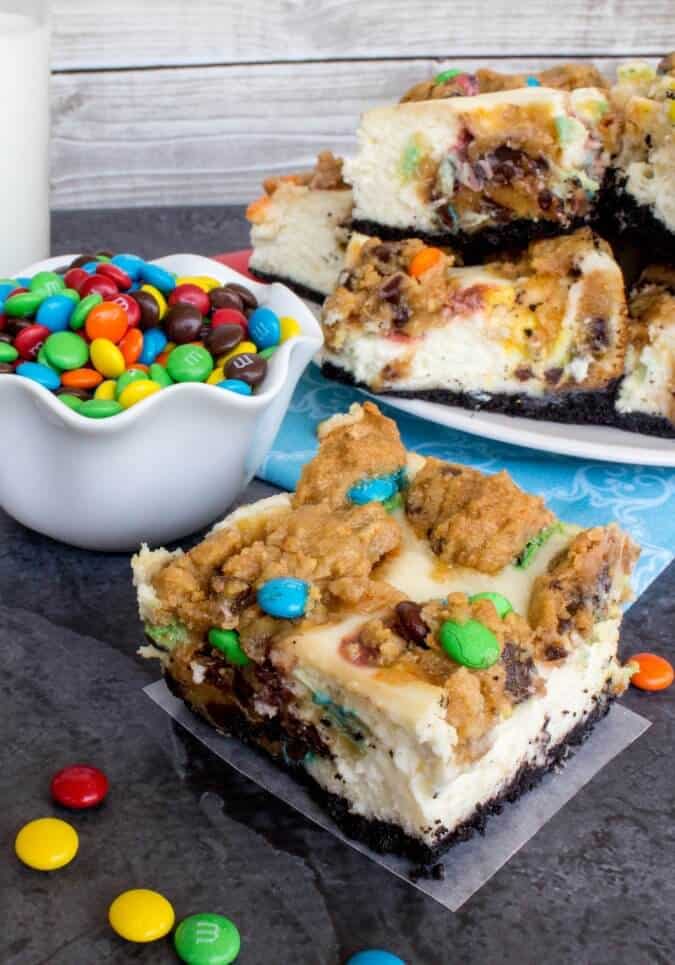 cheesecake and cookie swirled bars with M&ms