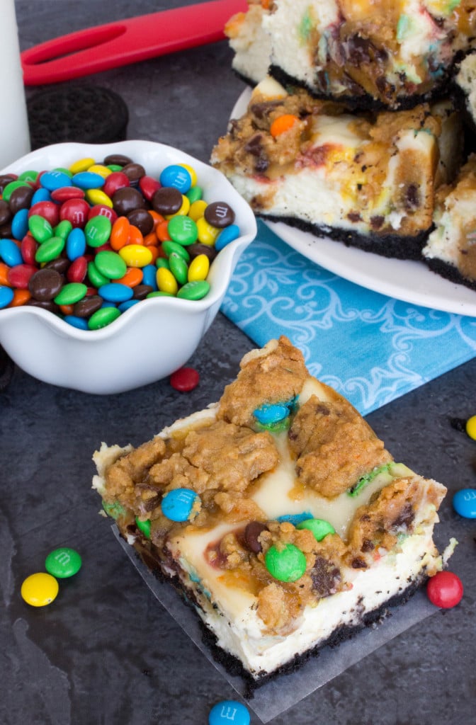 Monster Cookie Cheesecake Squares on an Oreo crust