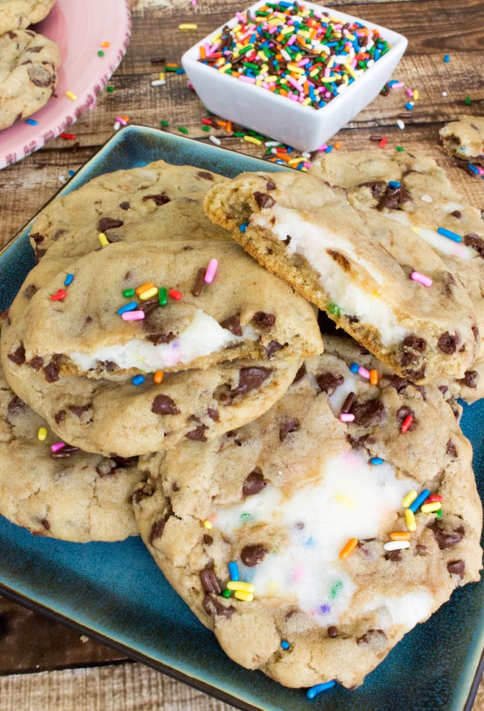 Funfetti filled chocolate chip cookies on blue plate