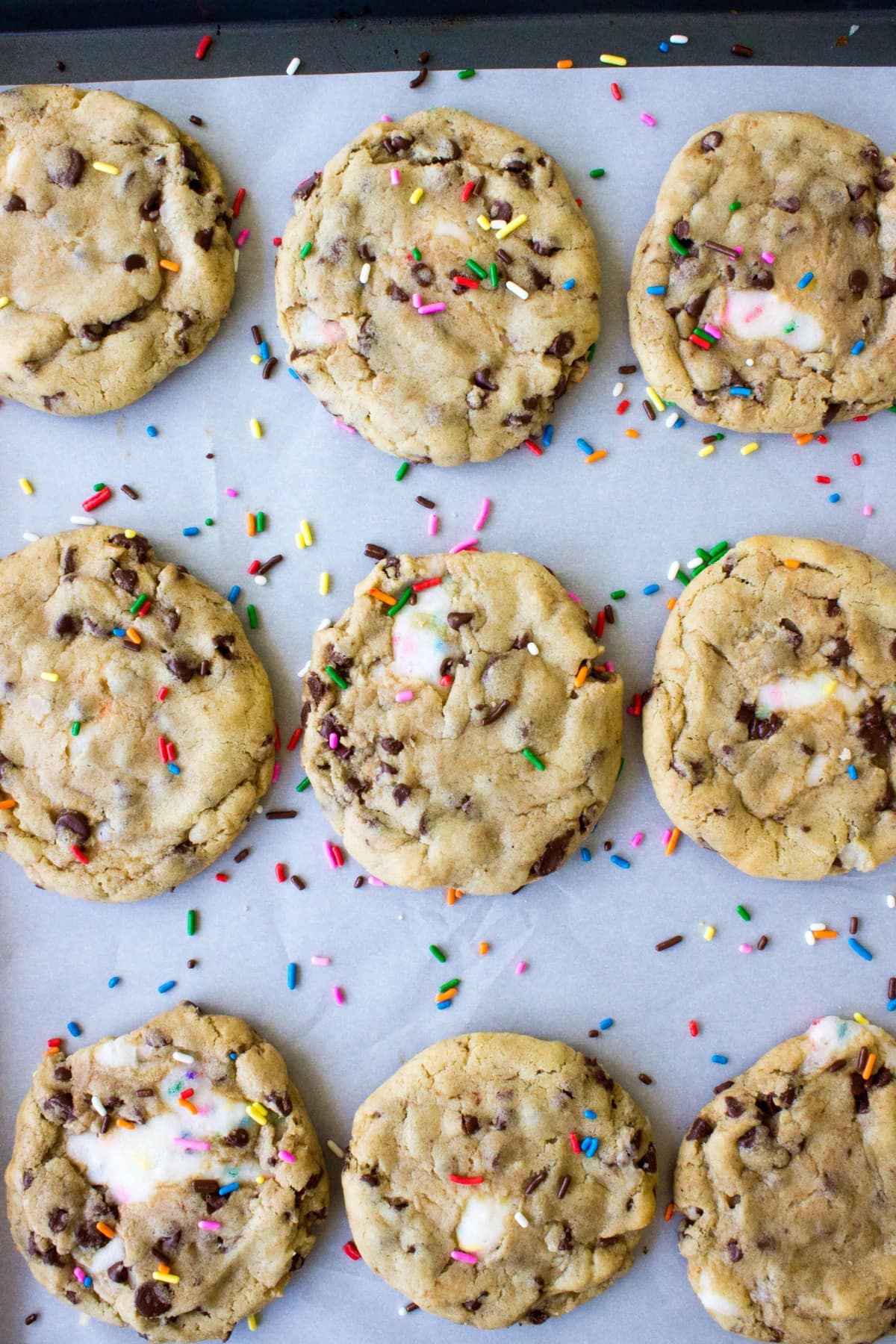 Funfetti Filled Chocolate Chip Cookies - Sugar Spun Run