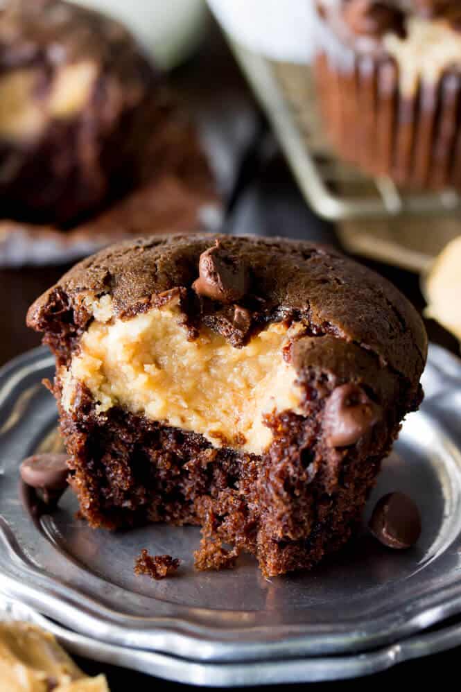 Peanut butter chocolate muffin, cut open to see the peanut butter filling