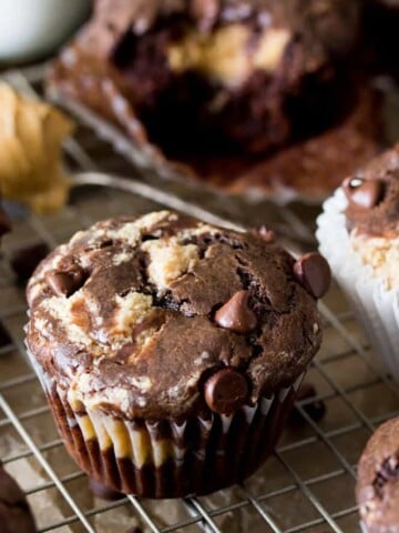 Peanut butter chocolate muffins on a cooling rack