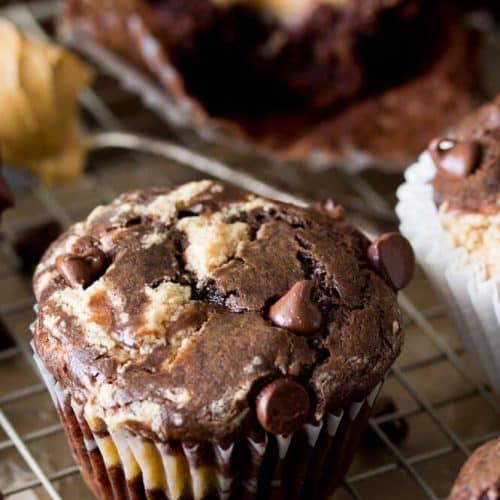 Peanut butter chocolate muffins on a cooling rack