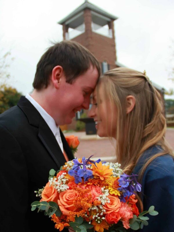newlyweds in front of church