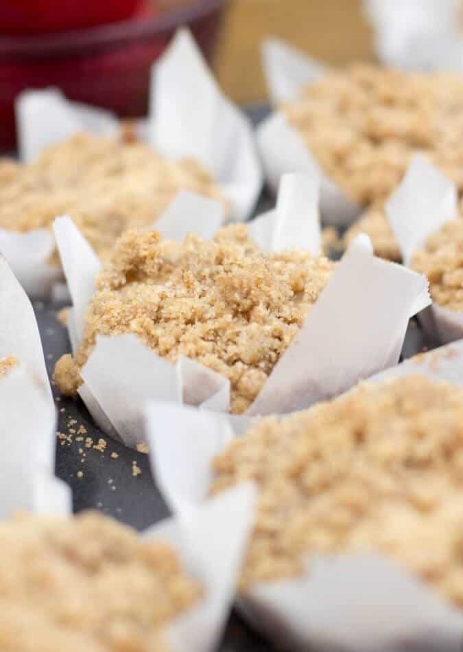 close-up of apple crumb muffin in baking tin