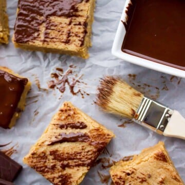peanut butter blondies brushed with melted chocolate