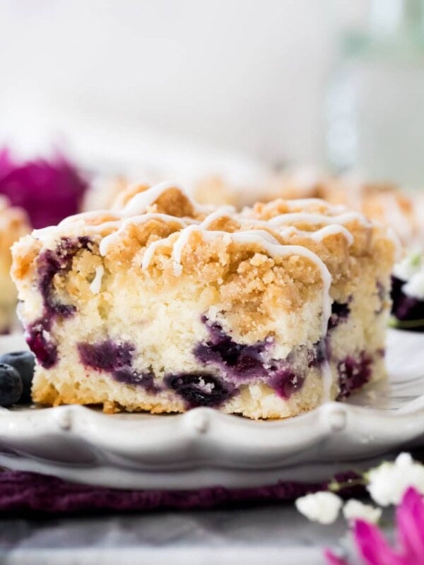 Blueberry coffee cake on white plate