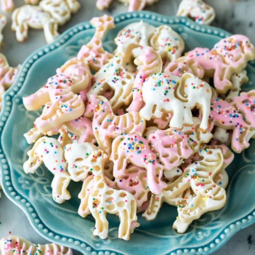 Frosted animal cookies on blue plate