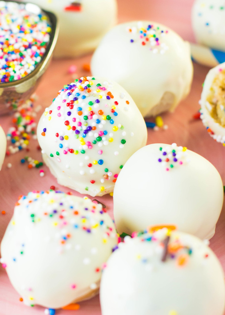 Oreo truffles with sprinkles on white plate