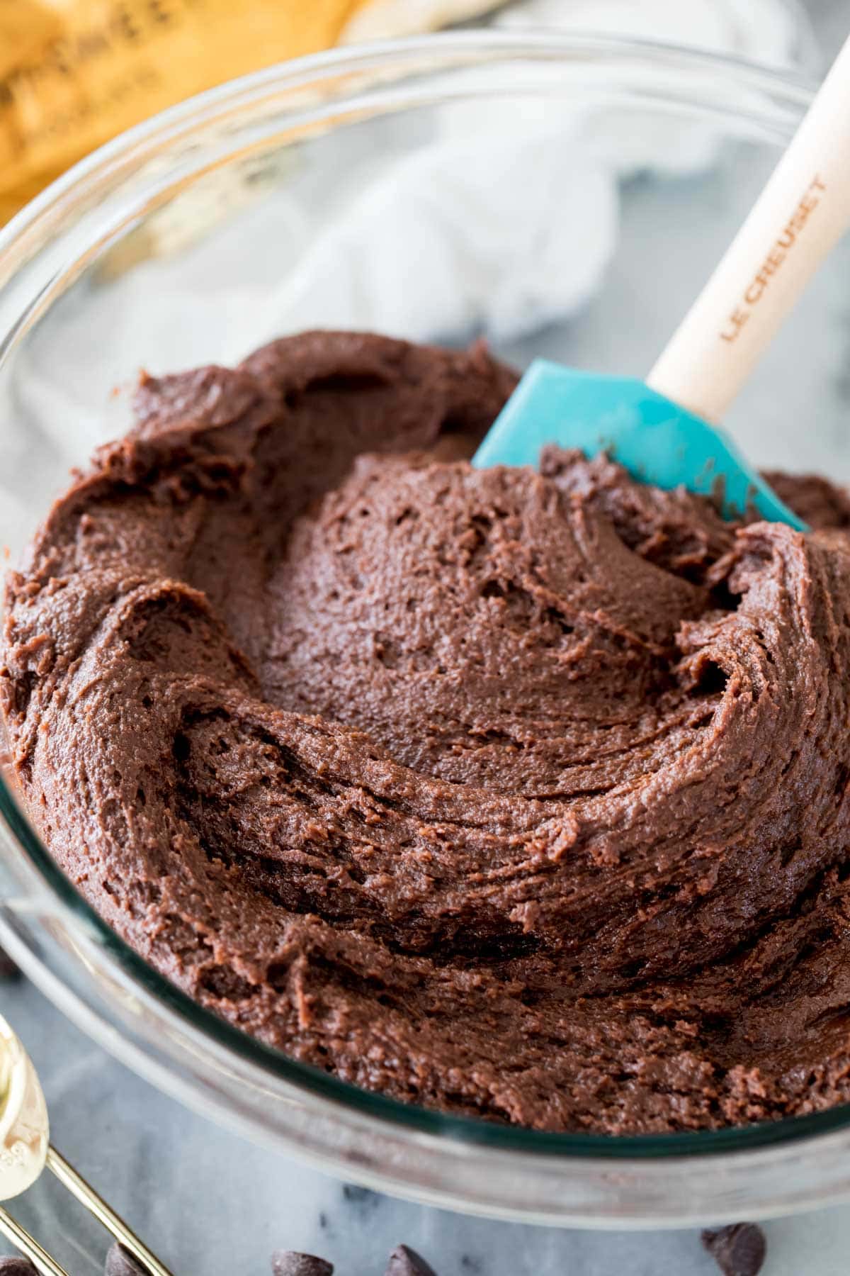 chocolate cookie batter in glass bowl