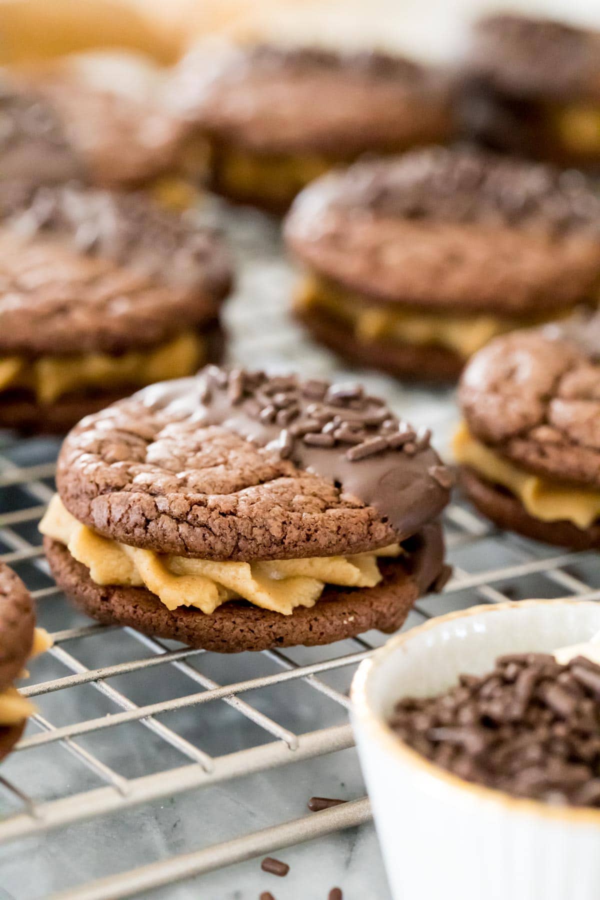 chocolte sandwich cookies on cooling rack