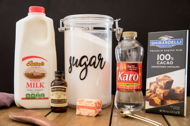 Ingredients for chocolate fudge (milk, sugar, corn syrup, chocolate, butter, vanilla)