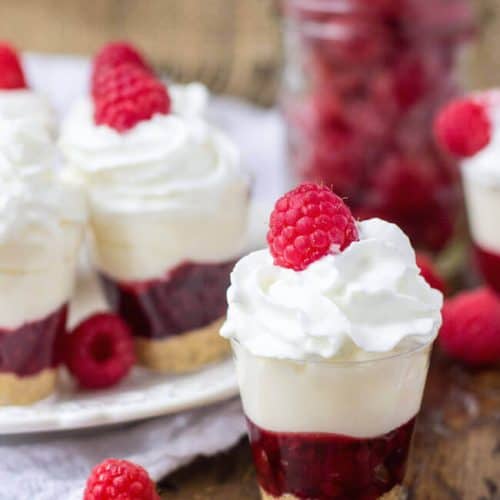 Raspberry shooters topped with raspberries