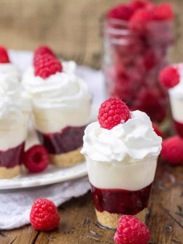 Raspberry shooters topped with raspberries