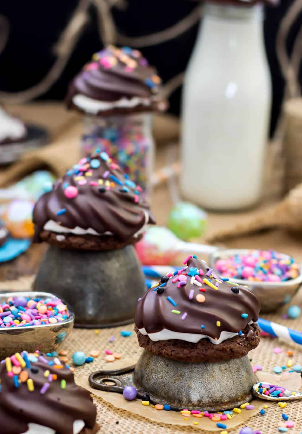 High Hat Cookies -- Chocolate brownie cookies topped with marshmallow frosting and dipped in chocolate