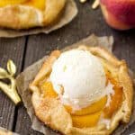 Peaches and cream galette, topped with a scoop of ice cream