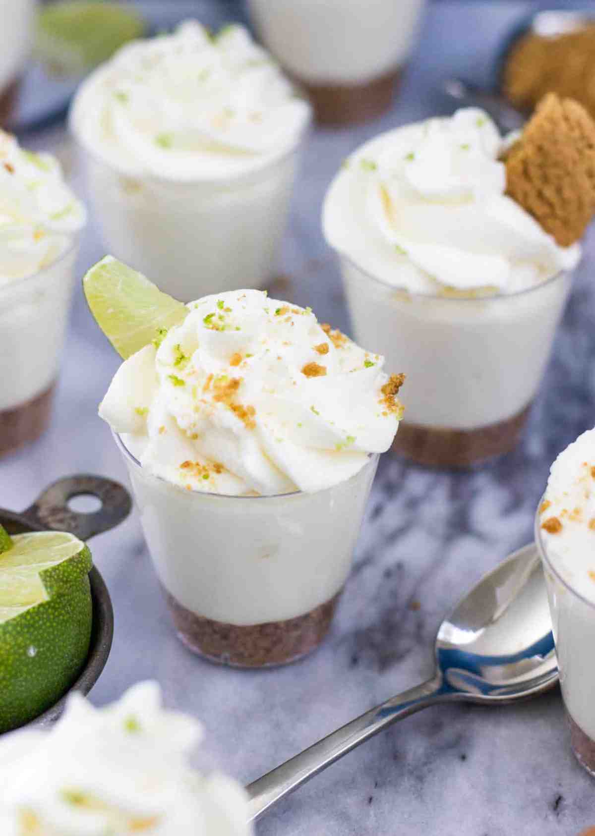 Key lime pie dessert shooters with gingersnap crust -- via SugarSpunRun