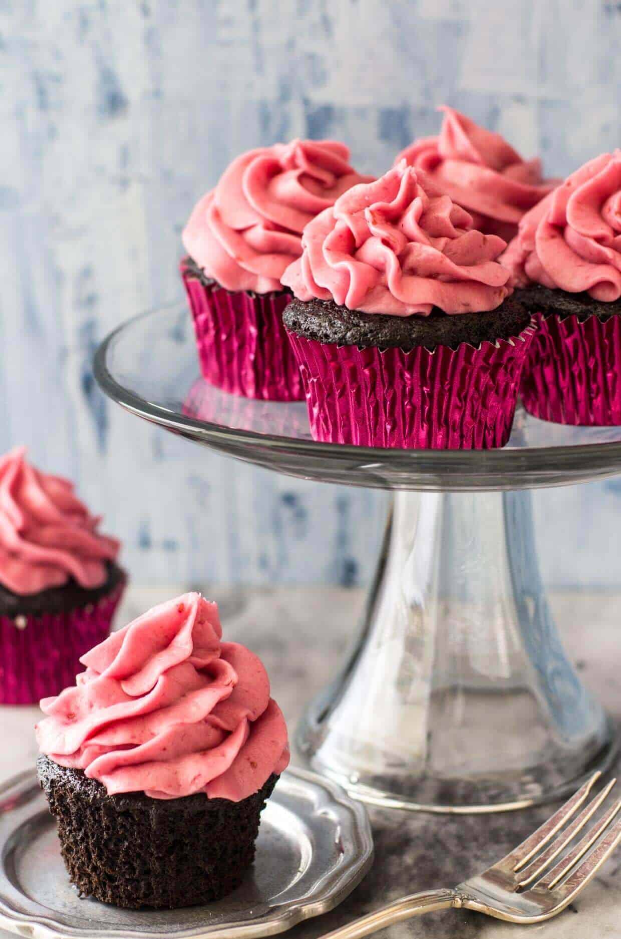 Dark Chocolate Cupcakes with Fresh Raspberry Frosting -- via Sugar Spun Run