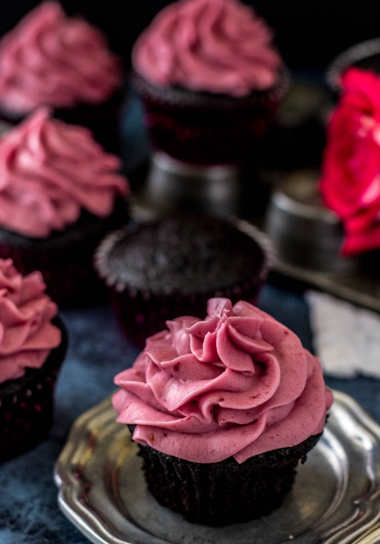 Dark Chocolate Cupcakes with Fresh Raspberry Frosting -- via Sugar Spun Run