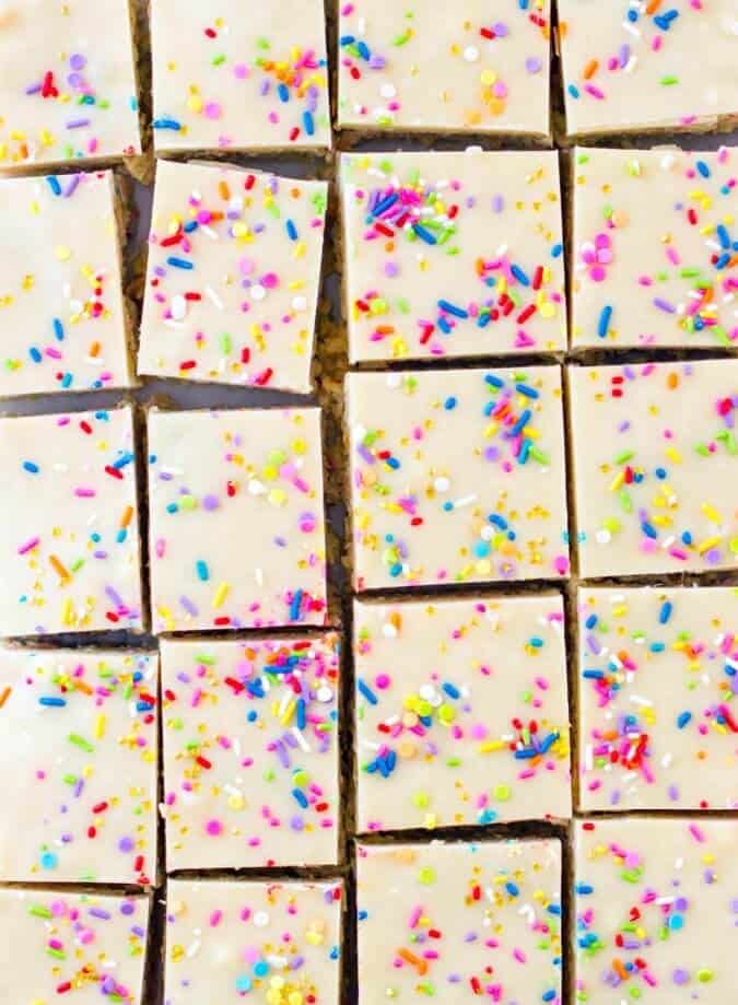 Overhead of cake batter rice krispie treats, cut in to squares