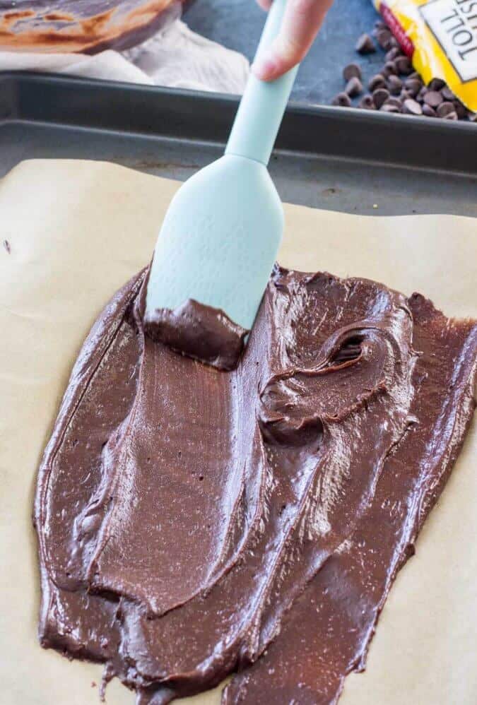 How to make brownie brittle: spread batter to potato chip thickness on parchment using spatula