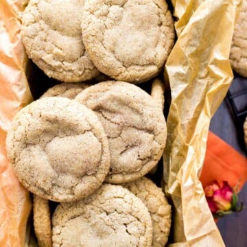 Pumpkin spice cookies piled in to a tray