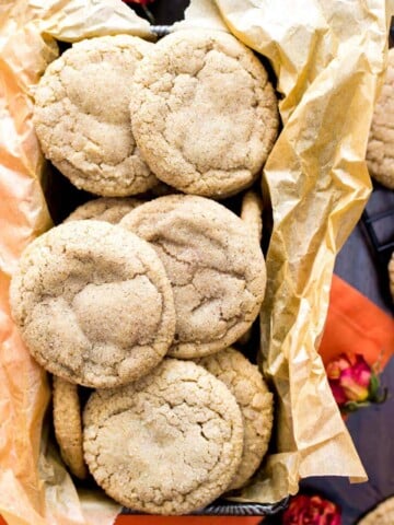 Pumpkin spice cookies piled in to a tray