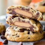 stack of peanut butter cup stuffed cookies cut in half