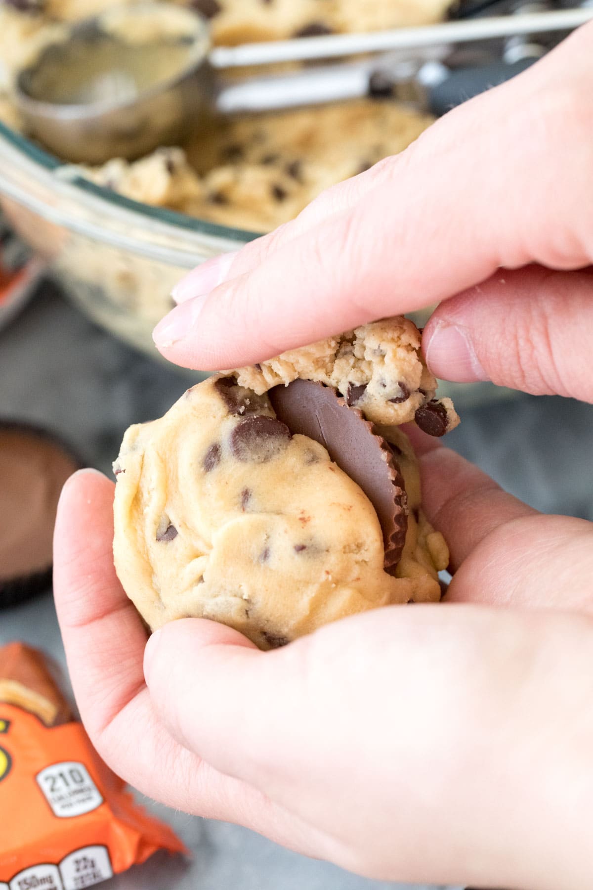 stuffing a reeses cup in cookie dough