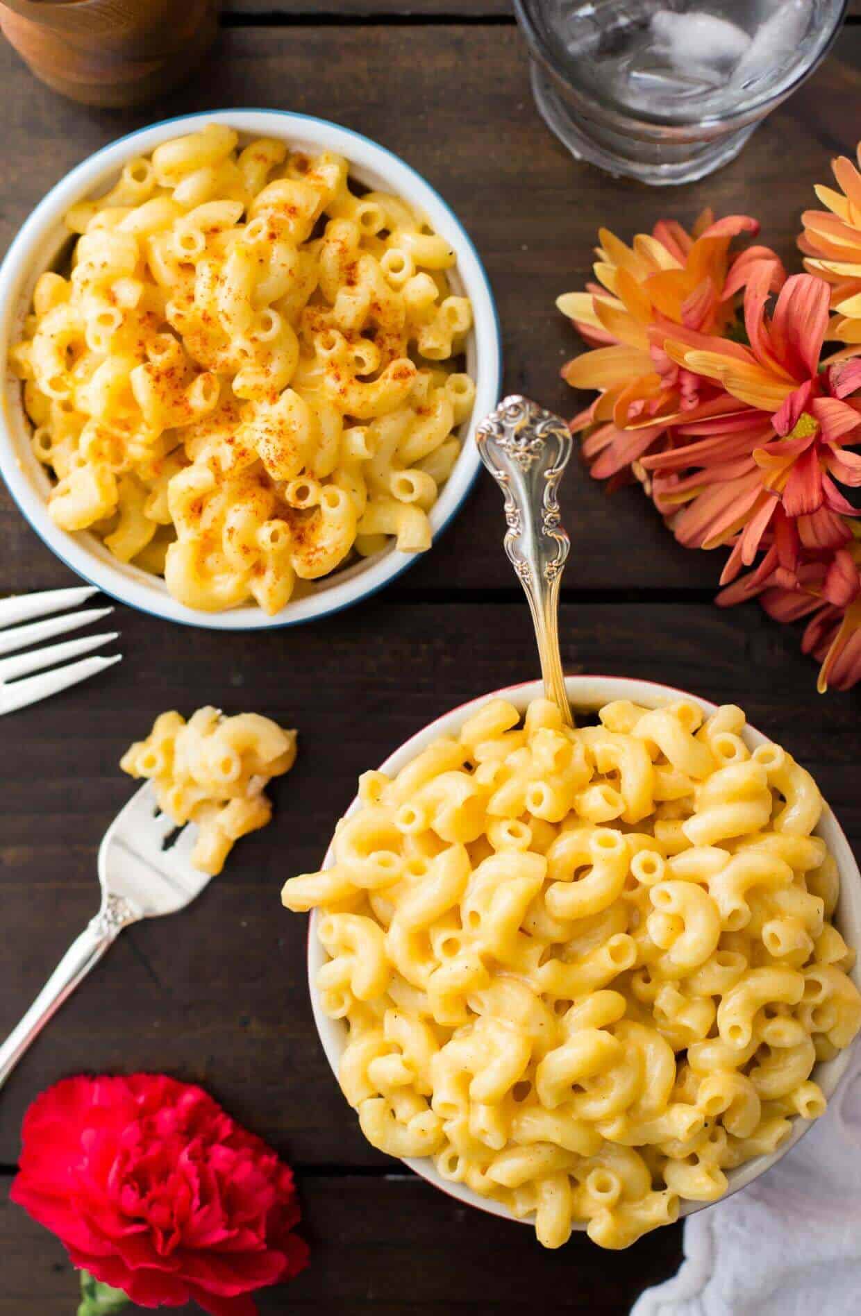 Two hot bowls of simple mac and cheese recipe without flour
