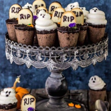 Ghosts in the graveyard dessert shooters arranged on a cake stand