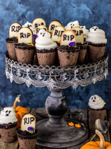 Ghosts in the graveyard dessert shooters arranged on a cake stand