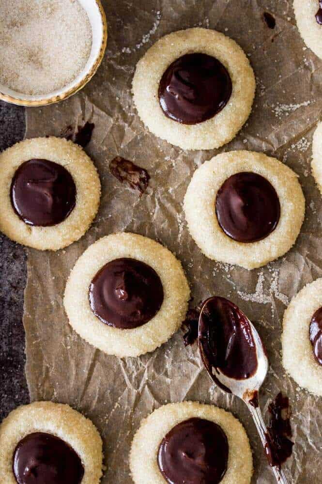 Chocolate Thumbprint Cookies -- Make sure you add a little bourbon to the ganache, it's amazing! || Sugar Spun Run