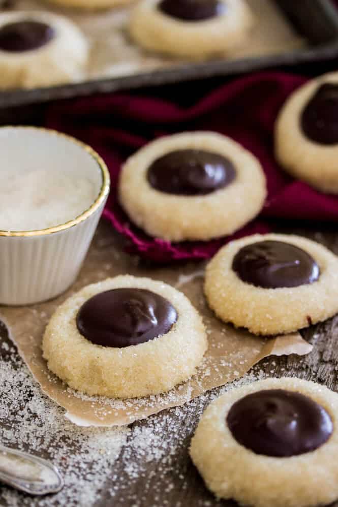 Chocolate Thumbprint Cookies -- Make sure you add a little bourbon to the ganache, it's amazing! || Sugar Spun Run