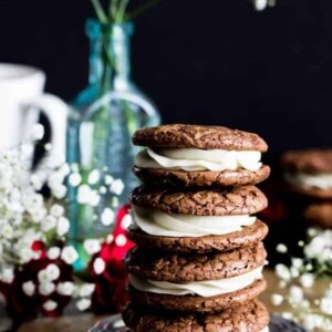 Stack of four espresso and cream cookies on a plate