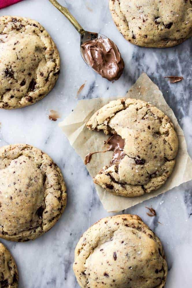 Nutella Stuffed Cookies - made with brown butter and sprinkled with sea salt! || Sugar Spun Run