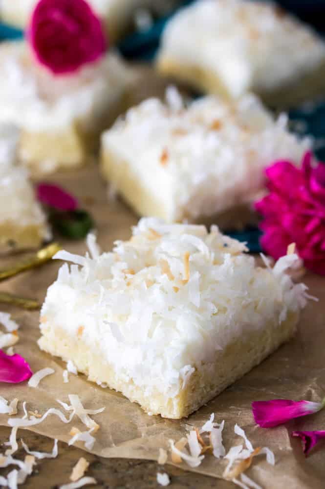 Coconut Cream Bars -- a light coconut frosting over buttery cookie bars || Sugar Spun Run