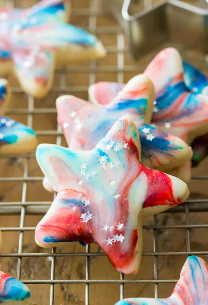 Stacked star spangled cookies on cooling rack