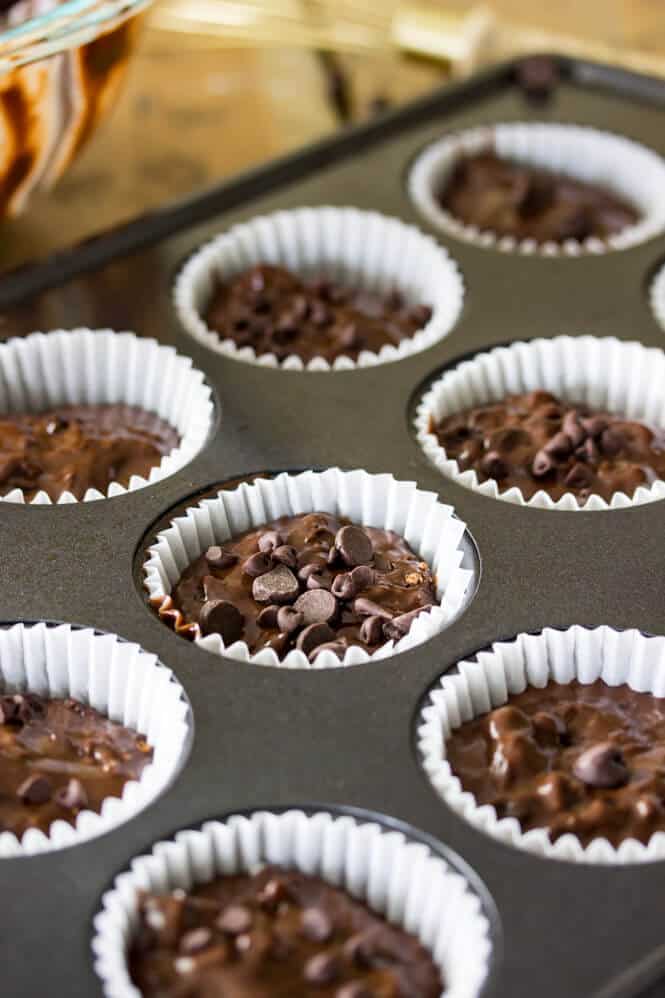 Portioning double chocolate muffin batter into prepared muffin tin || Sugar Spun Run