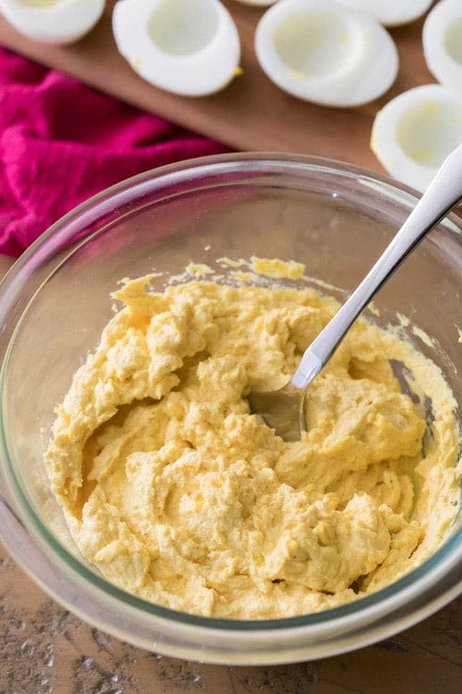 How to Make Deviled Eggs: Mashing the filling with a fork