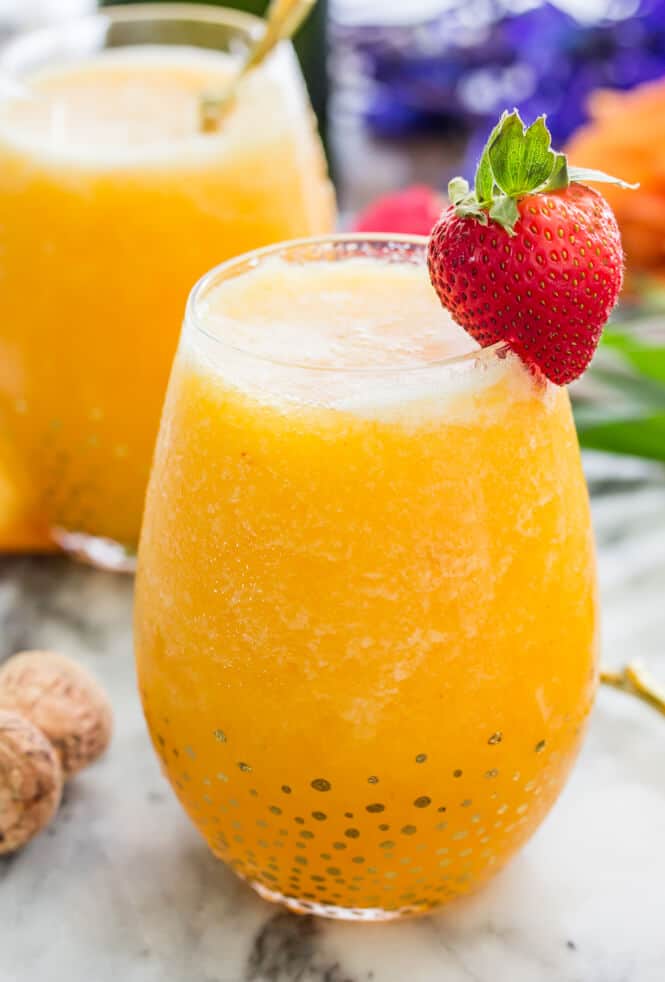 Frozen Peach Bellini - Sugar Spun Run - RecipeAddictive.com