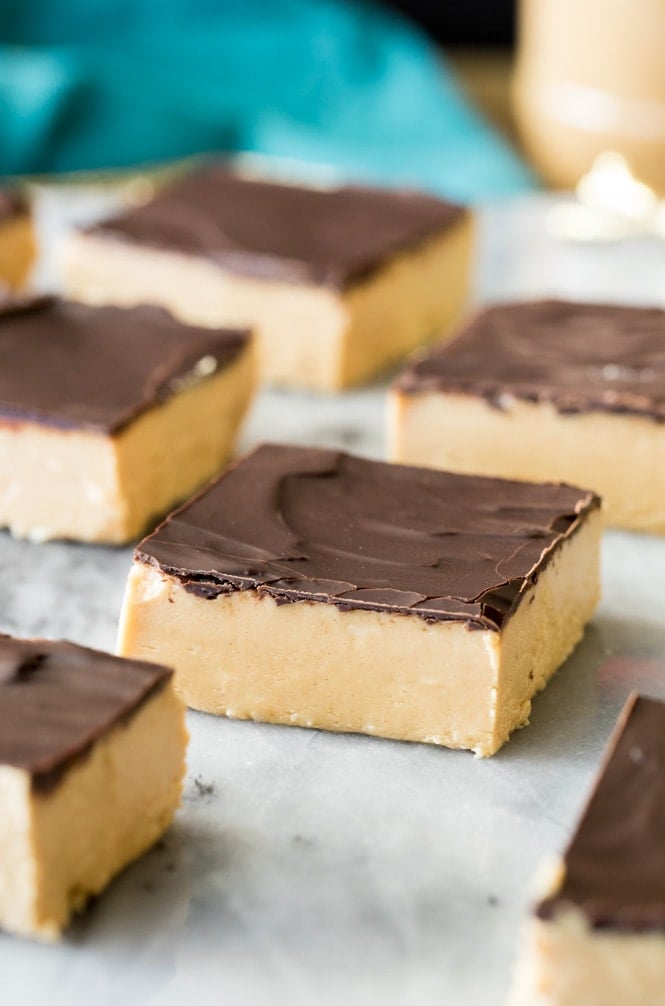 Creamy no-Bake Peanut Butter Bars on a marble board