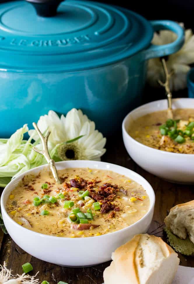 Corn chowder in white bowls